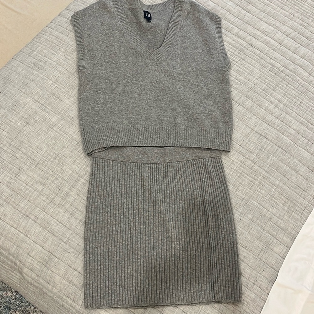 Sweater vest and skirt sold as a set